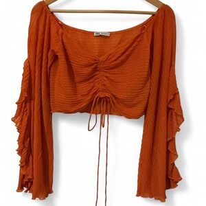 Orange Zara sheer off the shoulder crop top with flared ruffles sleeves.